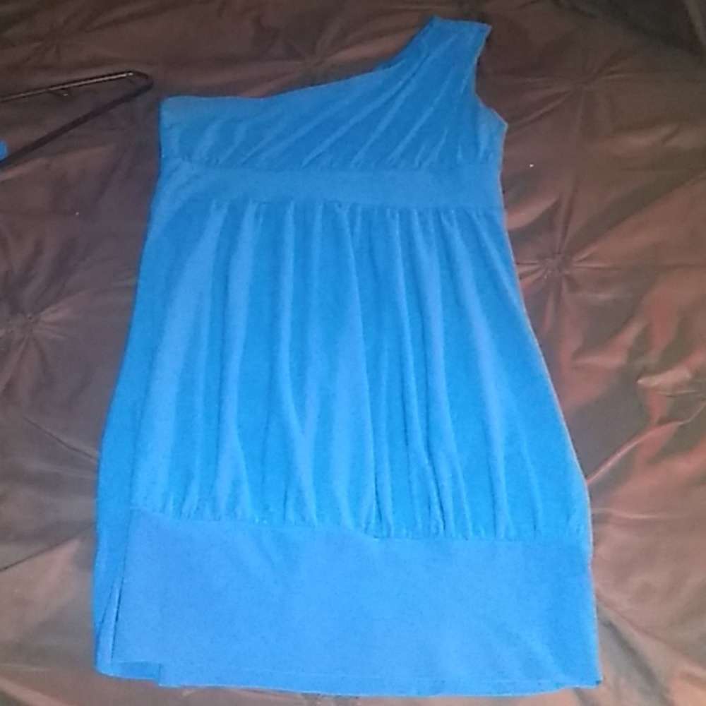 One shouldered dress.